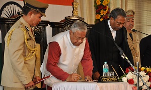 The Governor of Arunachal Pradesh Padmanabha Balakrishna Acharya signing oath paper in presence of Honble Chief Justice of Gauhati High Court Mr. Justice Shri Ajit Singh in the Darbar Hall of Raj Bhavan, Itanagar on Itanagar on 28th January 2017.